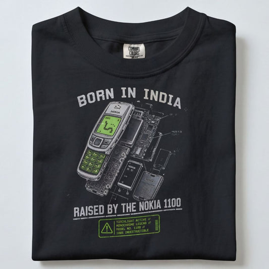BORN IN INDIA RAISED BY THE NOKIA 1100 UNISEX TSHIRT