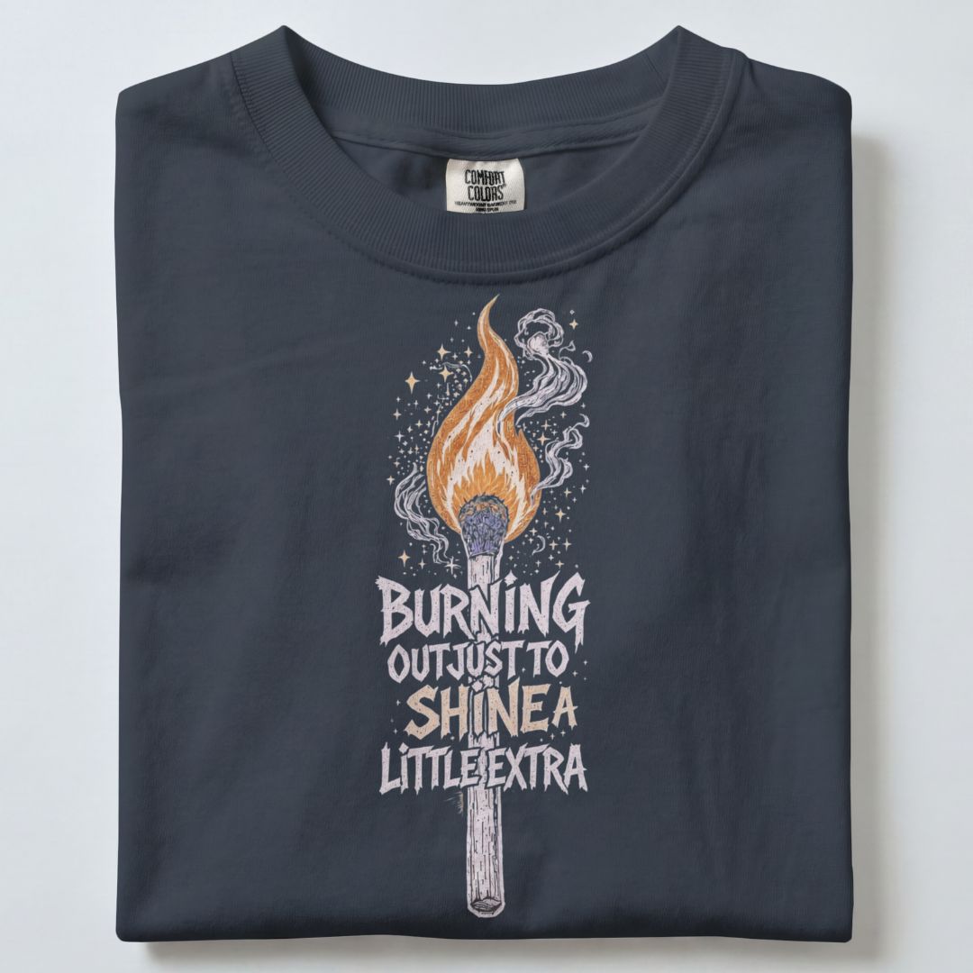 BURNING OUT JUST TO SHINE A LITTLE EXTRA UNISEX TSHIRT