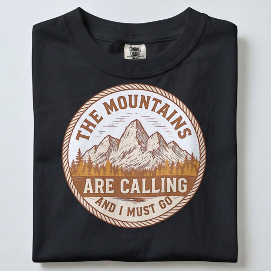 THE MOUNTAINS ARE CALLING AND I MUST GO UNISEX TSHIRT