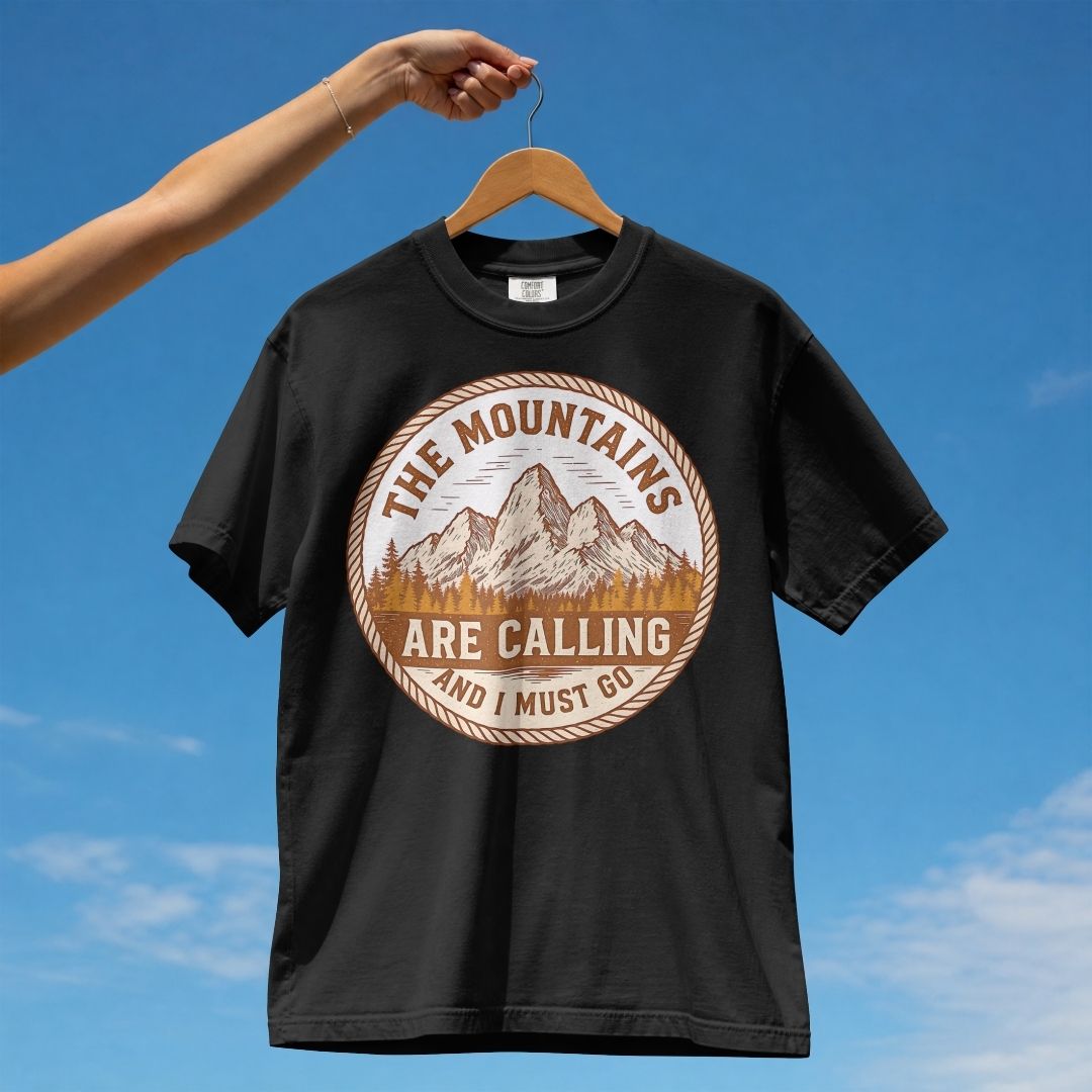 THE MOUNTAINS ARE CALLING AND I MUST GO UNISEX TSHIRT