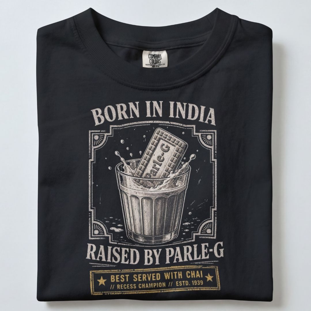 BORN IN INDIA RAISED BY PARLE-G UNISEX TSHIRT