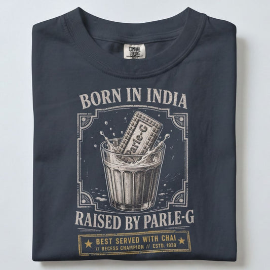 BORN IN INDIA RAISED BY PARLE-G UNISEX TSHIRT